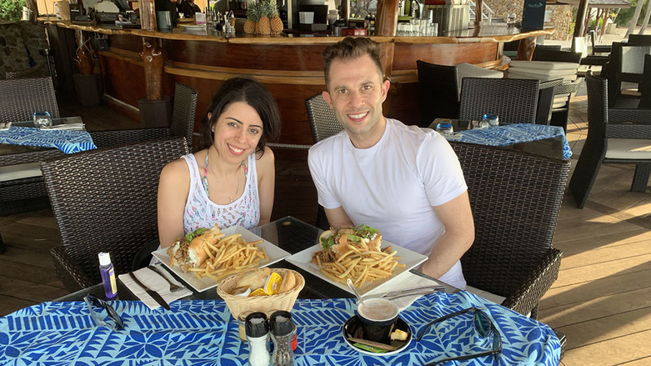 Splitting a Kebab Sandwich at the Hilton in Moorea beachside restaurant