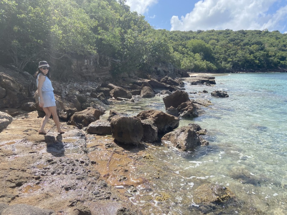 Hike from Galleon Beach in Antigua to see Pillars of Hercules, along ocean washed red rocks on shore